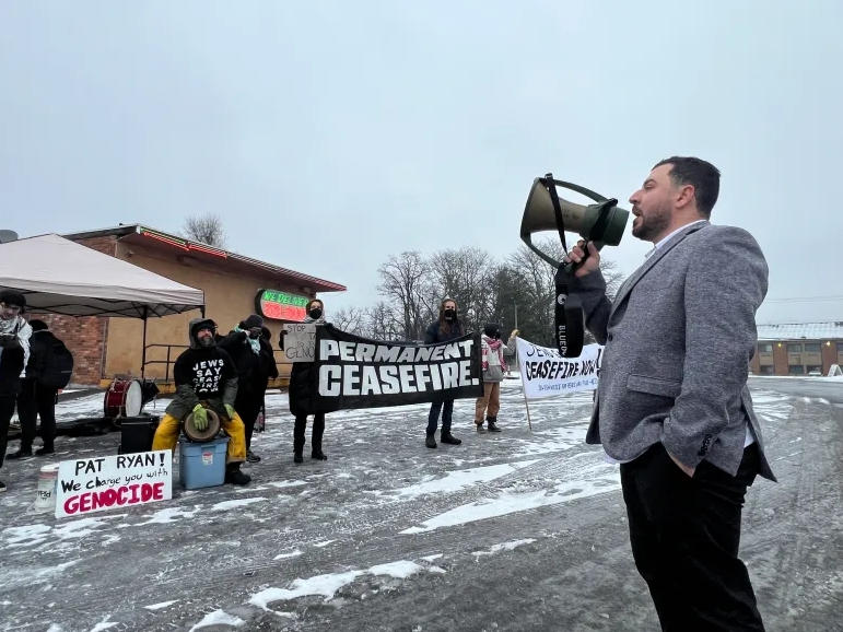 Protestors outside of the Kingston chamber breakfast